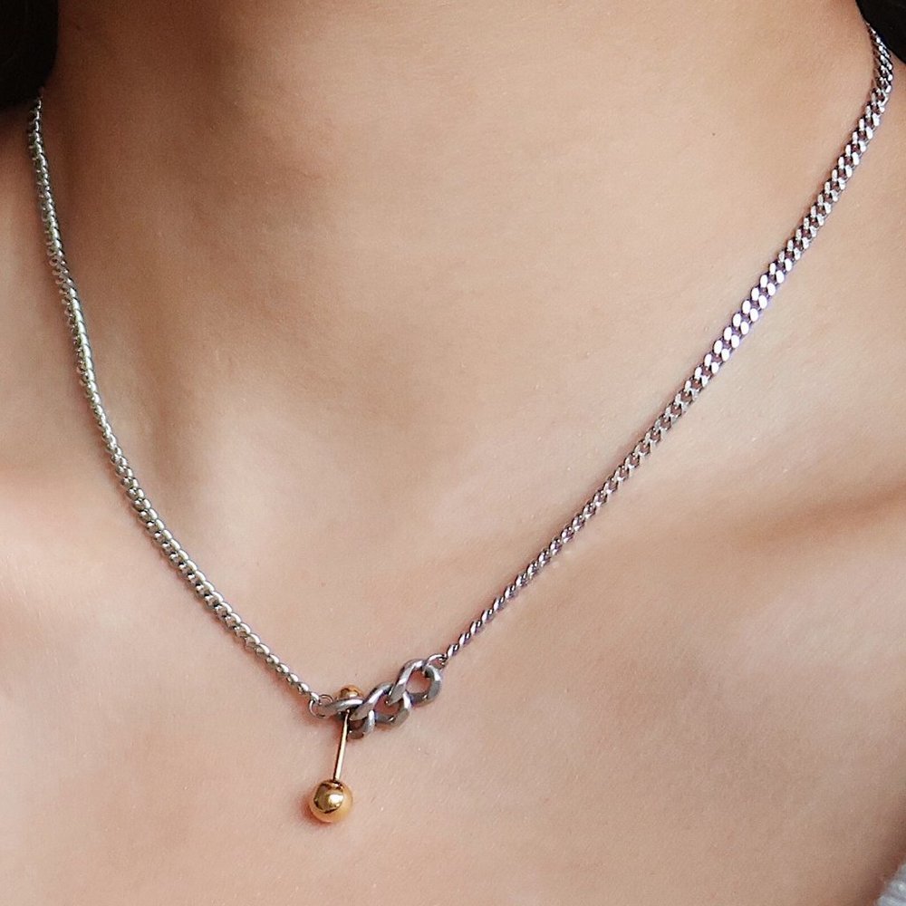 Elegant Silver and Gold Pendant Necklace